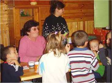 The orphanage they visited. The only children we saw that day (most were at school). Enjoying fresh homemade muffins and some fruit. YUM!